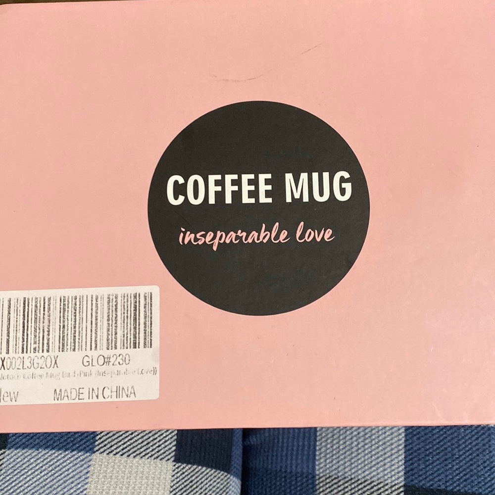 Pink and black coffee mug